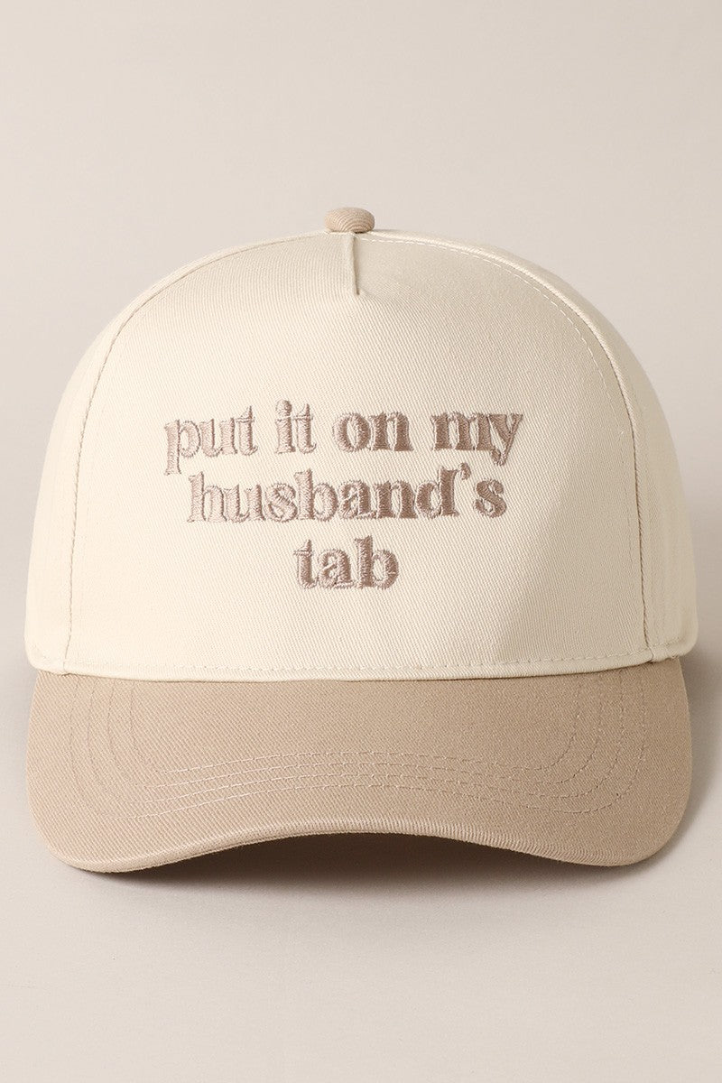 Put It On My Husbands Tab Trucker Hat