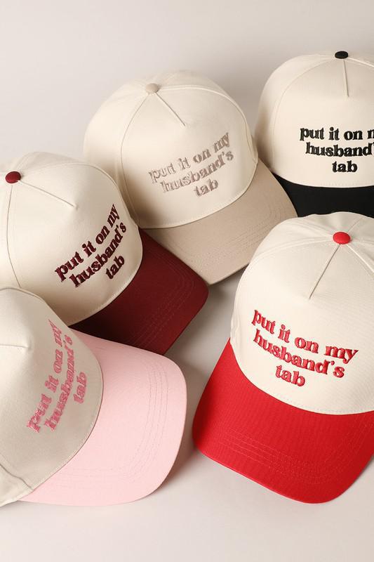 Put It On My Husbands Tab Trucker Hat